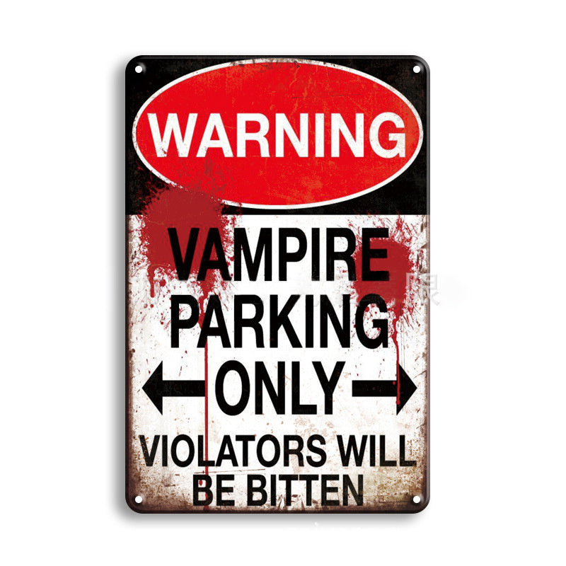 Metal sign with a warning design about vampire parking, on a white background