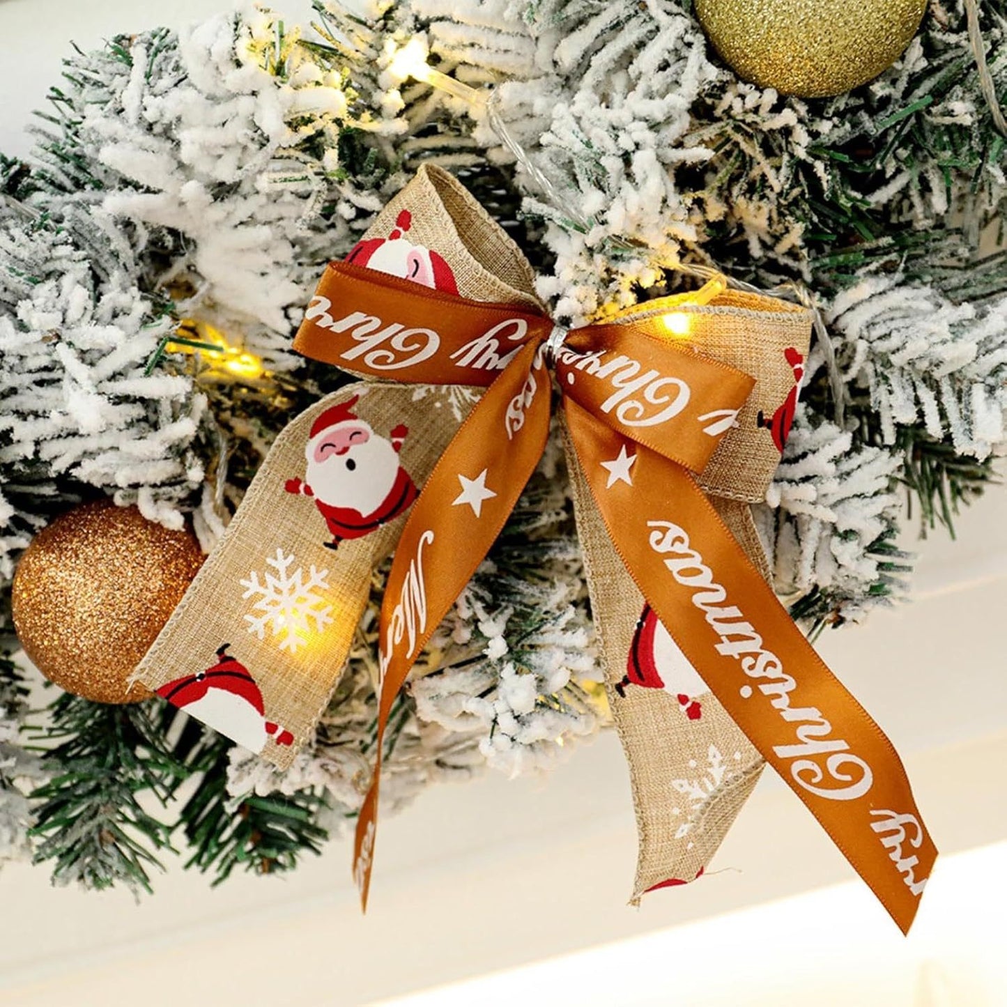 Decorative ribbon with Santa Claus design on a Christmas tree.