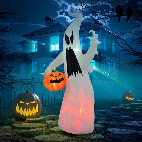 Halloween inflatable ghost with pumpkins in a spooky outdoor setting