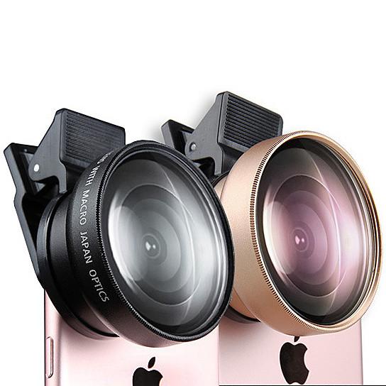 Two smartphone camera lenses on a white background